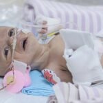 Less than a month old,this child is fighting heart disease.Help us save him